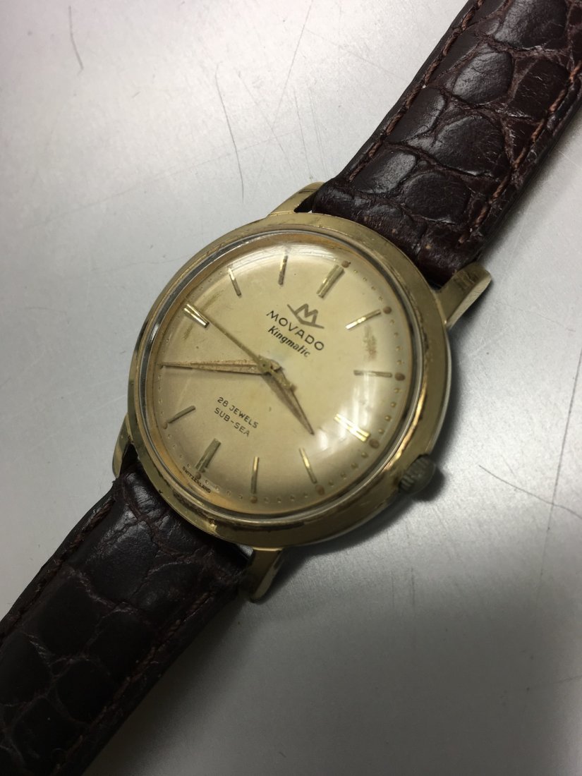 Movado man's wristwatch - gold top with stainless back: Movado man's wristwatch - gold top with stainless back