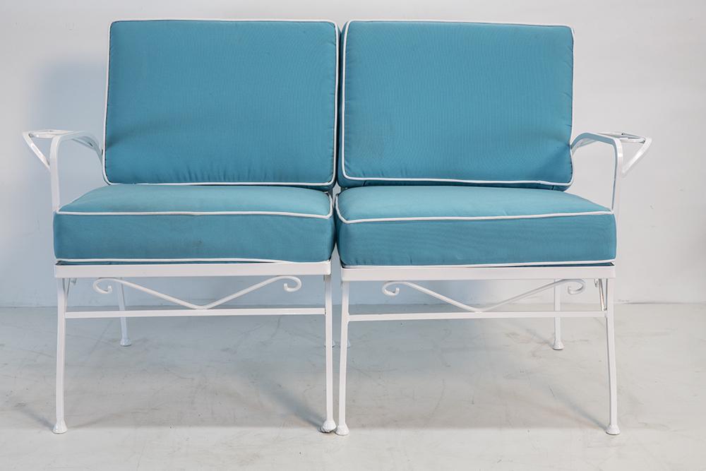 Russell Woodard Style Loveseat: Loveseat in teal. Restored.