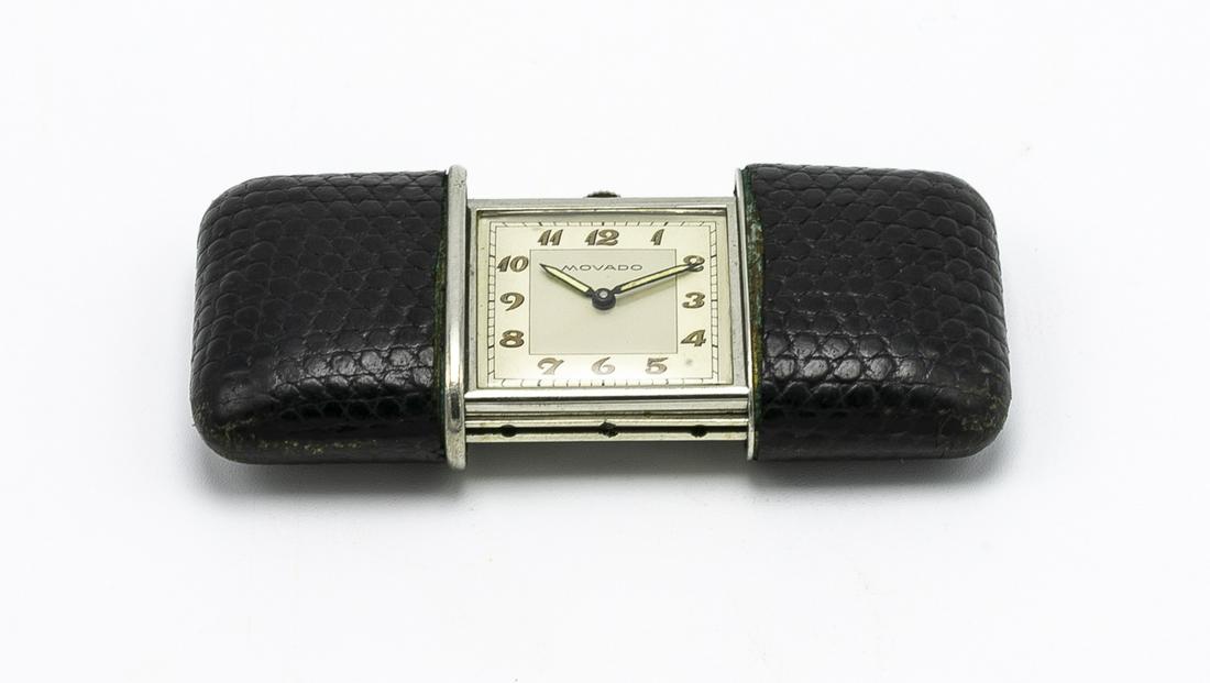 Movado Sterling Lizard Purse Watch: 3W x 1.5D