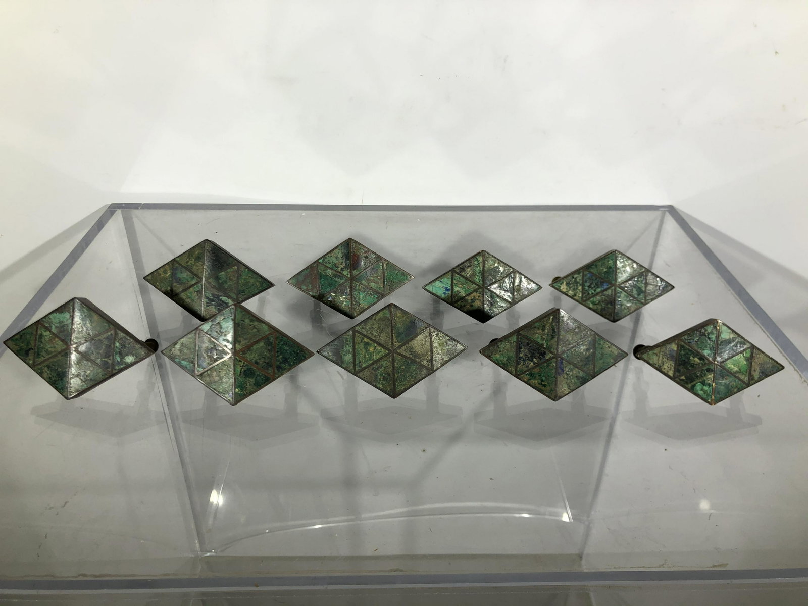 Los Castillos Drawer Pulls, Set of 9: Los Castillos Drawer Pulls, Set of 9, copper and azurite, signed, Mexico. Six are approximately 2.75"h x 4"w. Three are approximately 2.25"h x 4"w.