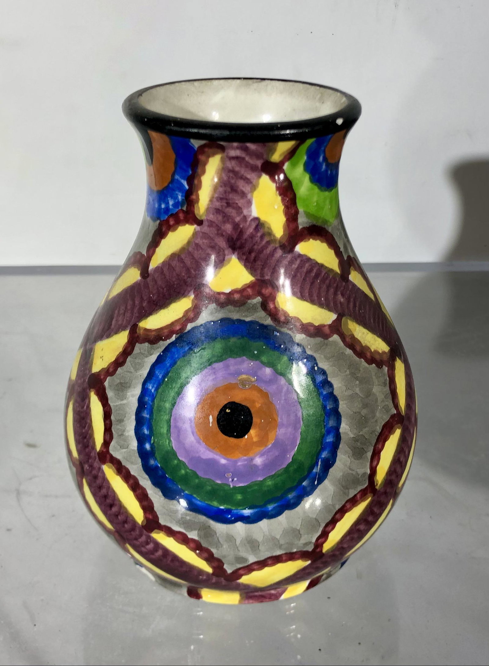 Eva Zeisel for Schramberg Vase, Germany: Eva Zeisel for Schramberg Vase, Germany, colorful glaze, Gobelin 1, Hand-painted, signed. Several small chips around edge of base. Approximately 6" tall.