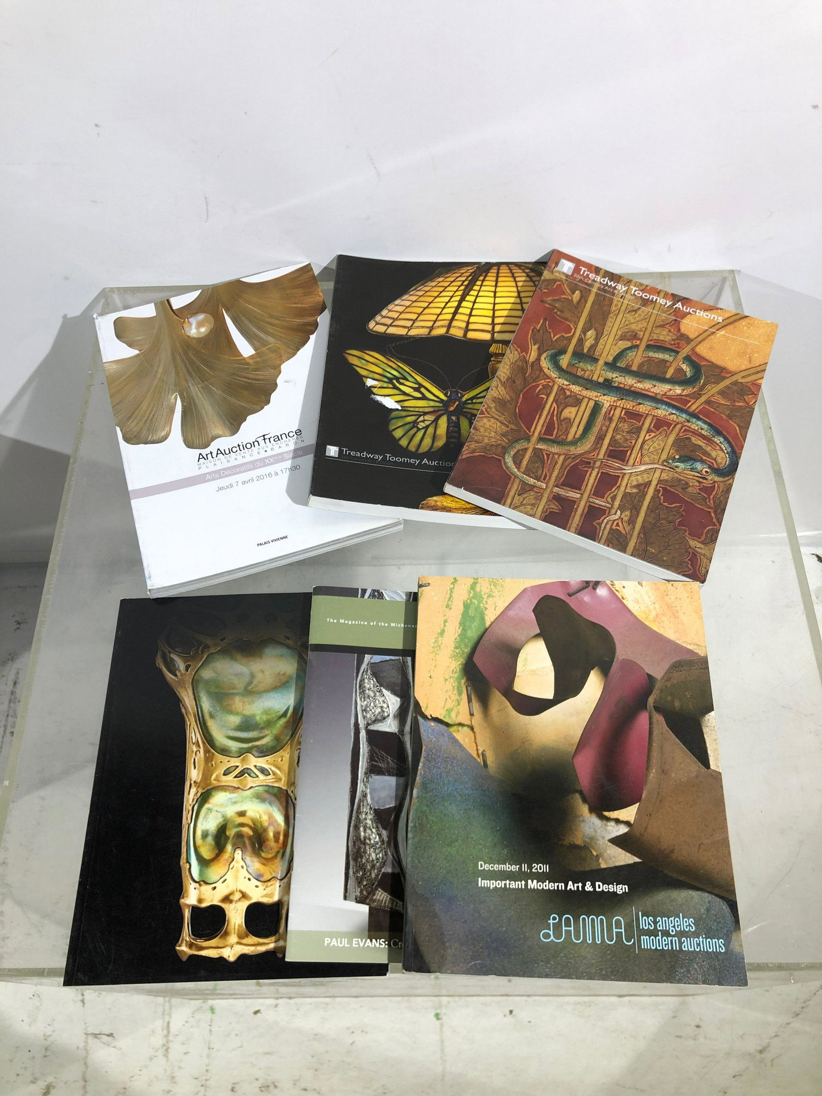 A Group of Auction Catalogs: Treadway, LAMA, others: A Group of Auction Catalogs: Treadway, LAMA, others, including works by Paul Evans, Tiffany and more
