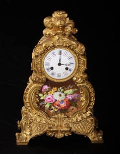 Ornate Gilt Bronze Clock w/Paris Porcelain Insert: Ornate Gilt Bronze Clock with Floral Paris Porcelain Insert. Dimensions: 15.5" high, 10.5" wide.