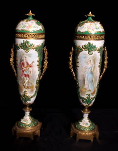 Pair of 19th Century Scenic Sevres Urns: Pair of 19th Century Scenic Sevres Urns. Artist signed. Dimensions: 19.5" high , 6" wide