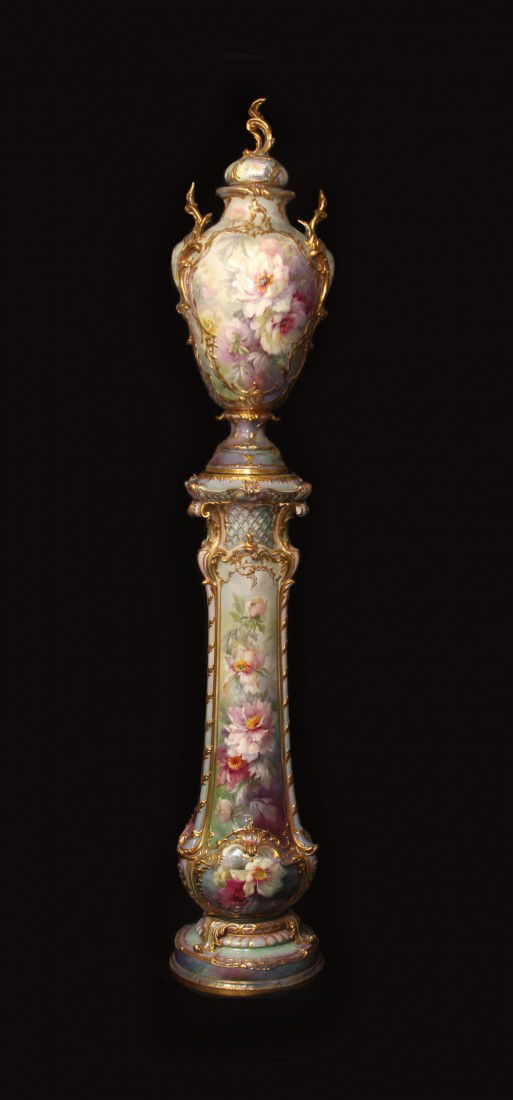 Monumental Floral-Decorated Porcelain-Capped Urn: Monumental Floral-Decorated Porcelain-Capped Urn on Pedestal. Artist signed. Dimensions: 34" height(urn), 50" height(pedestal), 15" diameter at base of pedestal