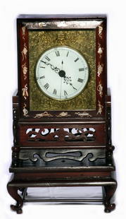 Asian Inlaid Rosewood Clock: Asian Inlaid Rosewood Clock. Dimensions: 18.75" high, 8.75" deep, 10.5" wide.