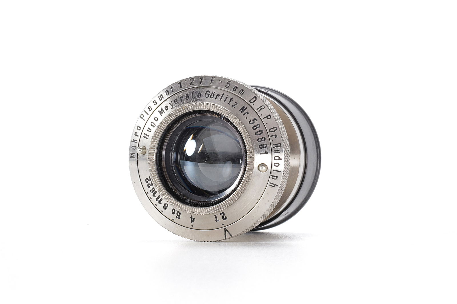 Hugo Meyer Makro Plasmat 5cm f/2.7: Extrem seltenes Makro Plasmat von Hugo Meyer in vernickelter Ausführung mit original Contax Anschluss. Die Optik mit minimaler alterstypischer Beschlagsbildung und Staubeinschlüssen. Es ist