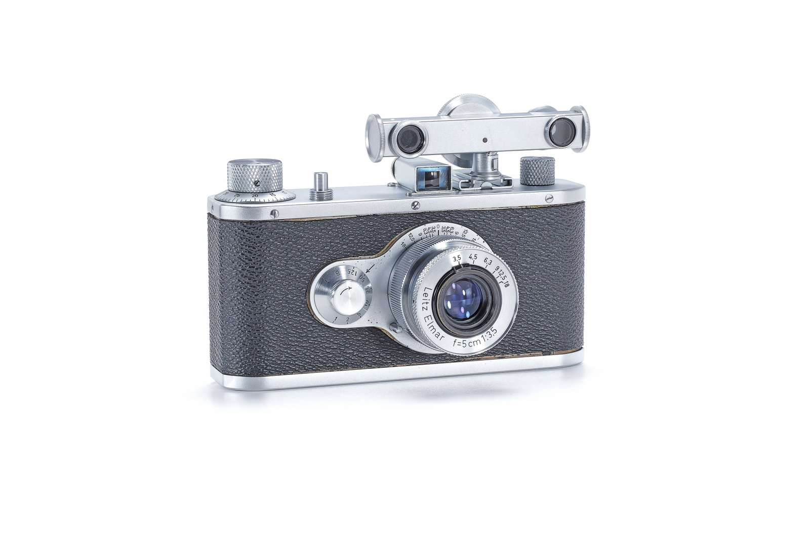 Leitz Prototype Camera 24x24mm: Experimentelle Leica Kamera mit 24x24 mm Bildformat, Zentralverschluss und fest eingebautem Leitz Elmar 1:3.5/5 cm Objektiv. Vermutlich steht dieser Prototyp aus der frühen Nachkriegszeit im Zusammen