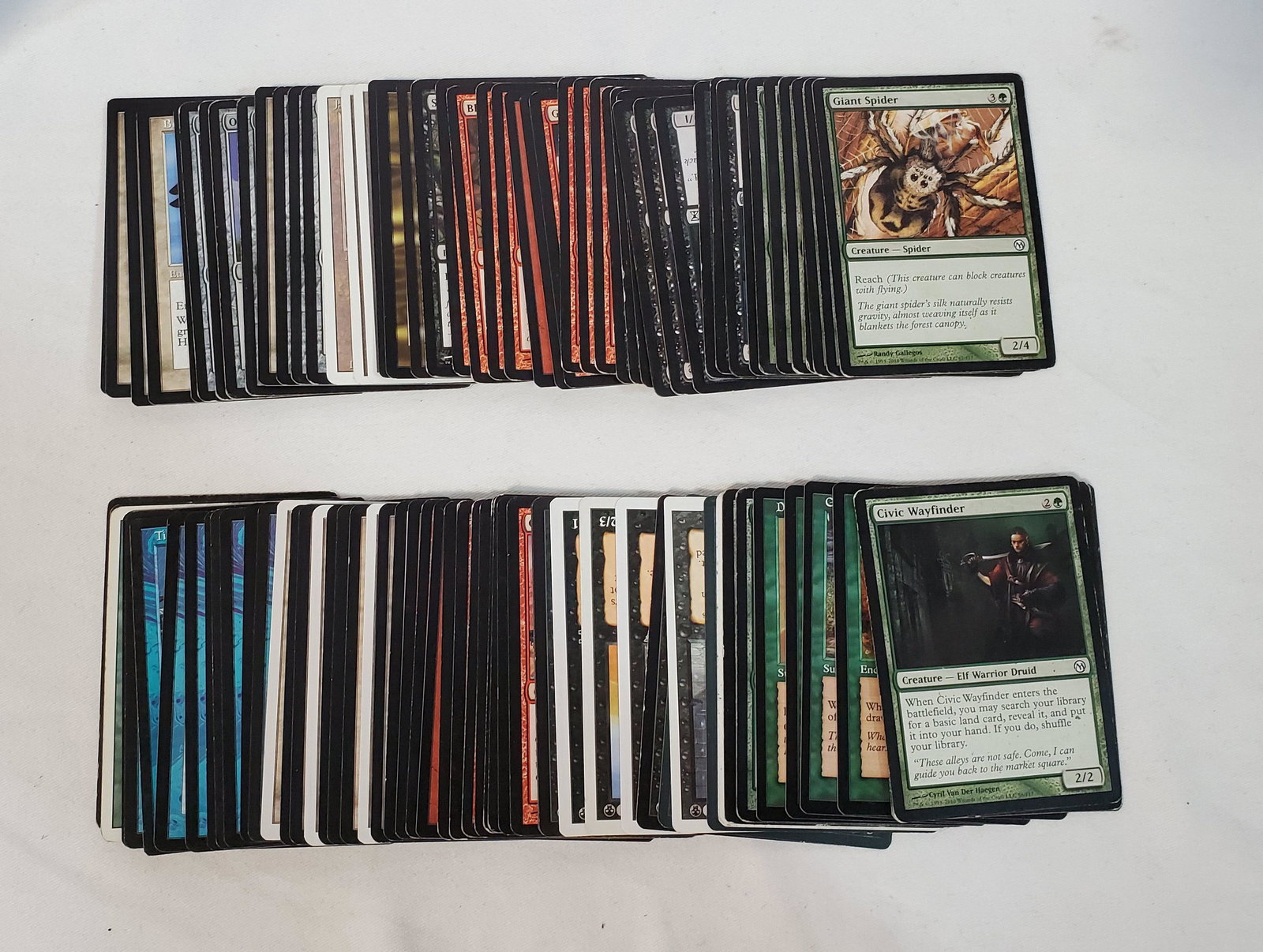 100 Miscellaneous Magic the Gathering cards: This is a stack of 100 random Magic the Gathering Cards. Its a mix of creatures and land cards.