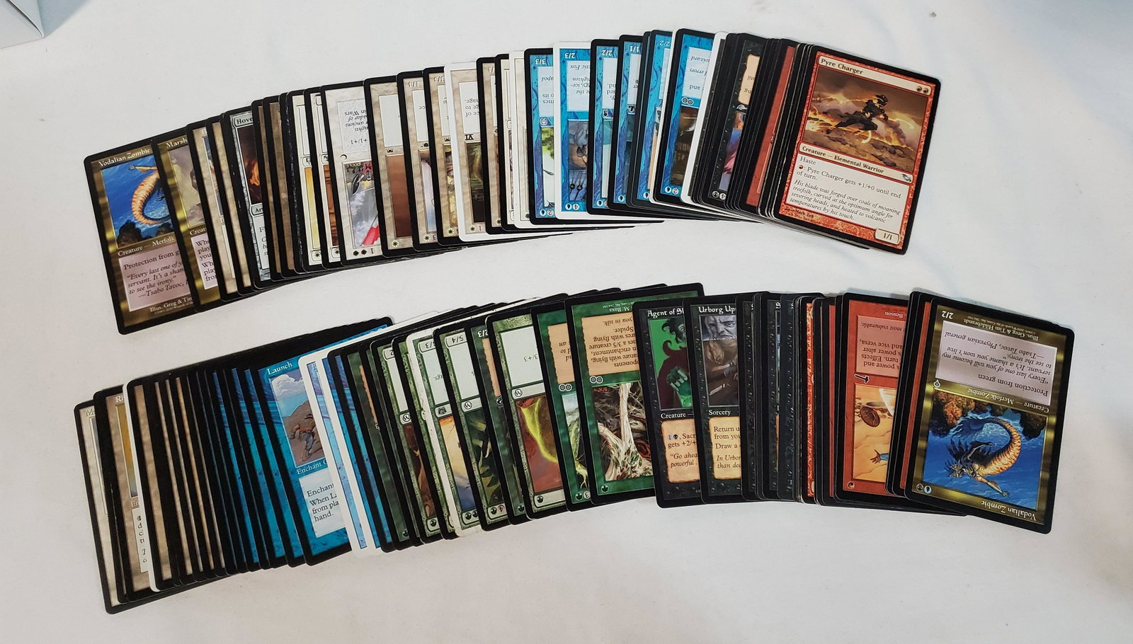 100 Miscellaneous Magic the Gathering cards: This is a stack of 100 random Magic the Gathering Cards. Its a mix of creatures and land cards.