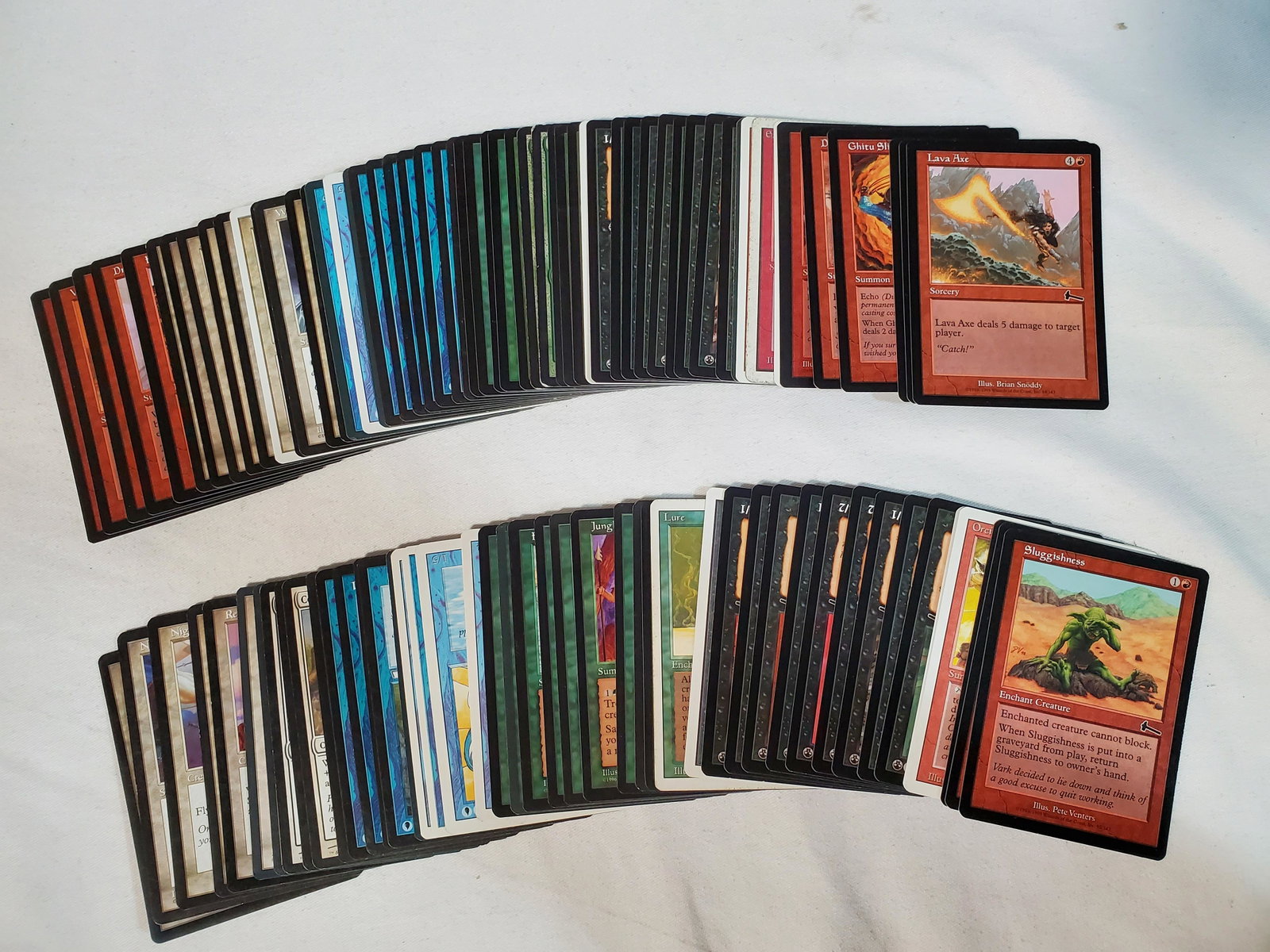 100 Miscellaneous Magic the Gathering cards: This is a stack of 100 random Magic the Gathering Cards. Its a mix of creatures and land cards.
