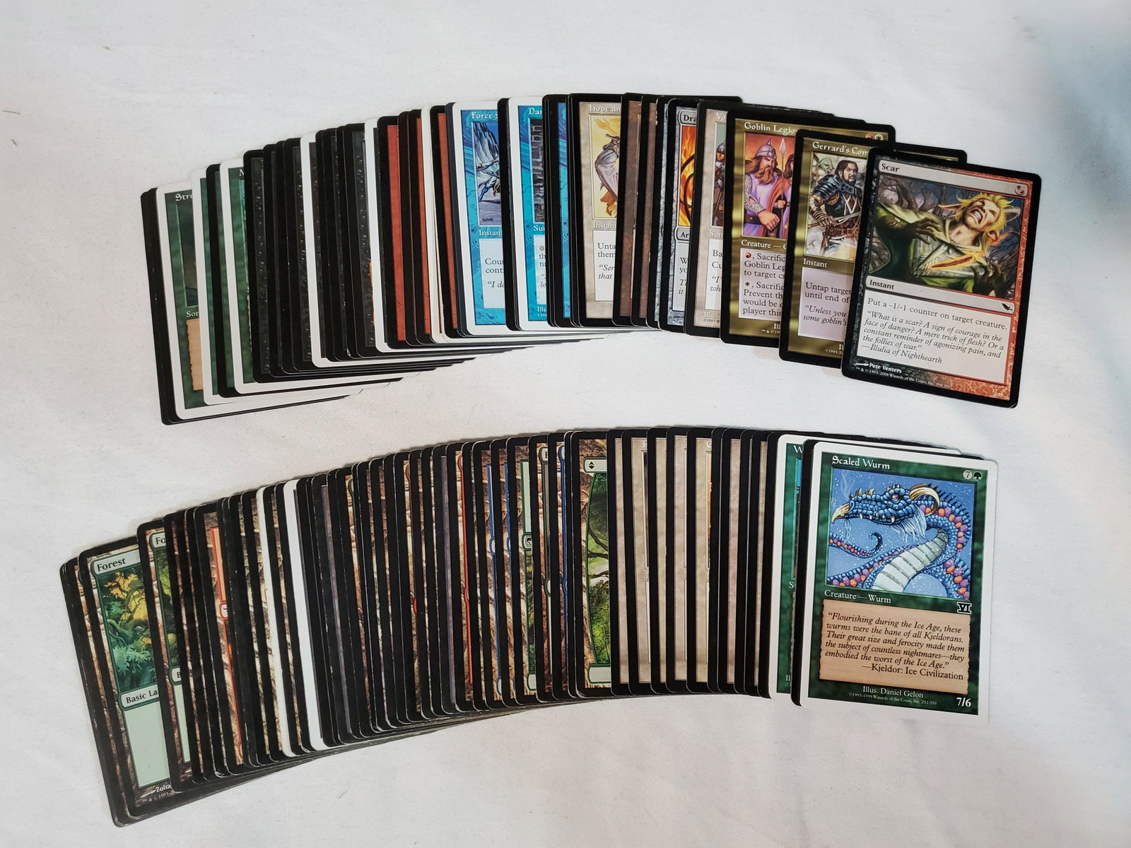 100 Miscellaneous Magic the Gathering cards: This is a stack of 100 random Magic the Gathering Cards. Its a mix of creatures and land cards.