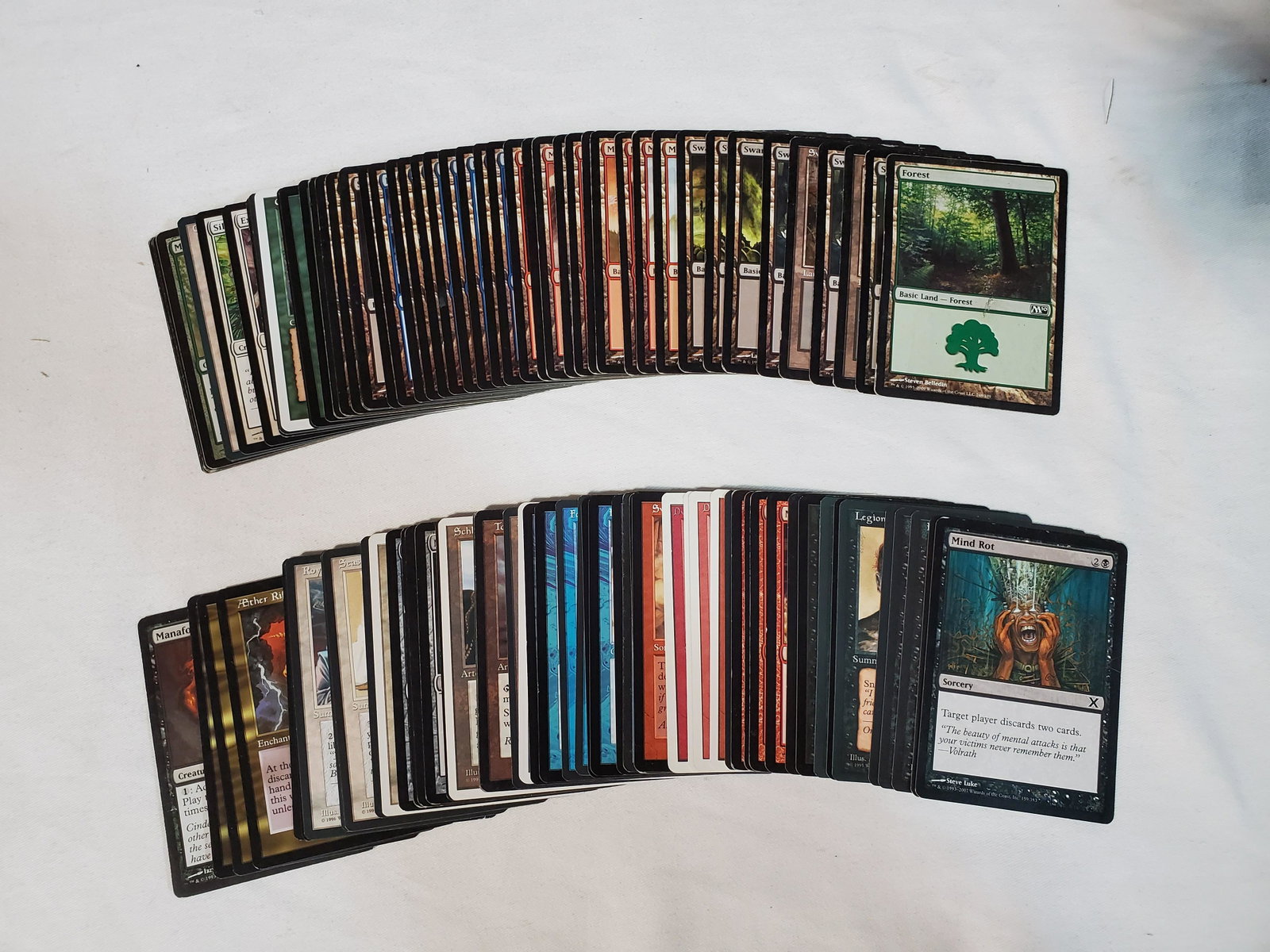 100 Miscellaneous Magic the Gathering cards: This is a stack of 100 random Magic the Gathering Cards. Its a mix of creatures and land cards.