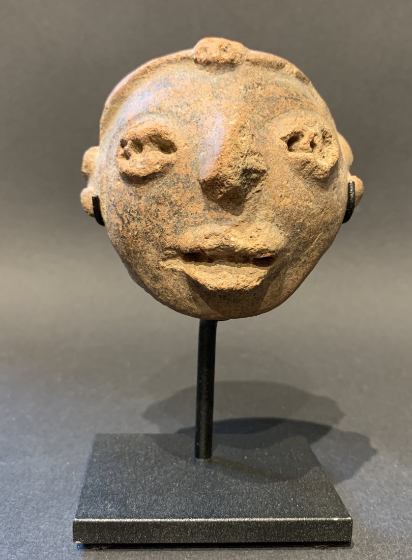 Olmec Head (crop offering)~. Pre-Colombian 1200 BC -: Olmec Head (crop offering)~. Pre-Colombian 1200 BC - 400 BC Pre-Columbian terra cotta heads turned up in open fields. This suggests that these effigies were "sown” or ritually buried, in corn fields