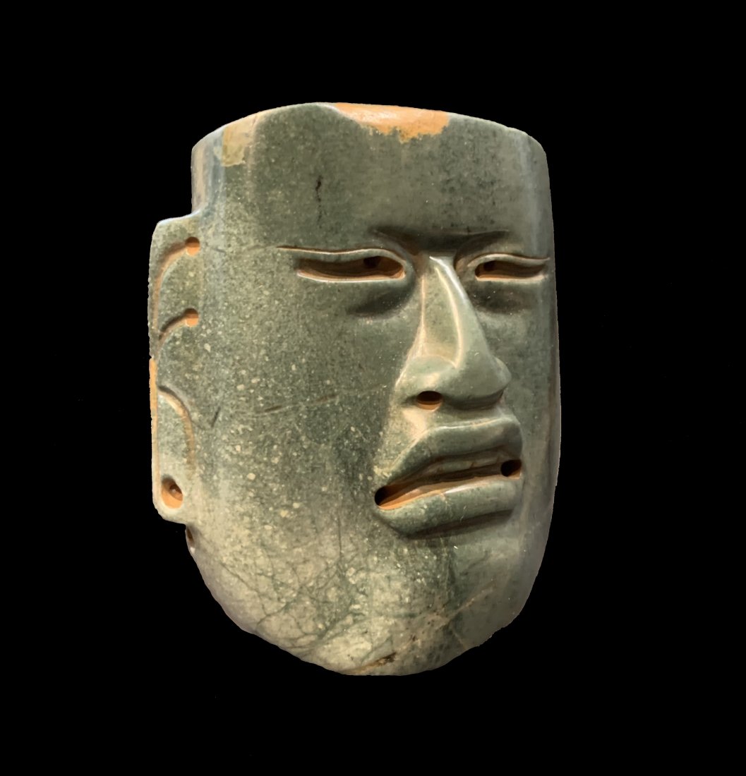 Large Olmec Jade Dwarf Burial Mask (900 BC - 600 BC): Large Olmec Jade Dwarf Burial Mask (900 BC - 600 BC) Toward the end of the Olmec civilization the use of Gods faces for the burial masks took a turn toward more human characteristics. No longer do we