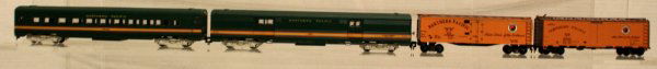 HO Scale Northern Pacific A.C. Gilbert Co. Reefer: HO Scale Northern Pacific A.C. Gilbert Co., 1 Reefer Car, 1 Weighted Northern Pacific Reefer Car, 1 Baggage Car, and 1 Passenger Car Grading: C6 VG Box: N
