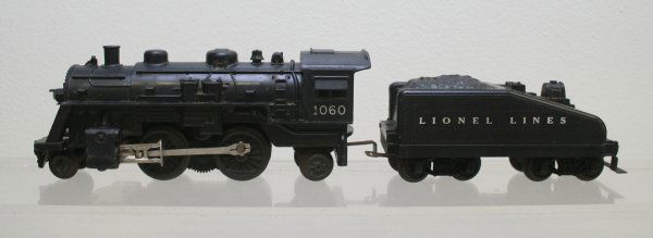 Lionel O Scale Postwar 1060 Scout Locomotive & Ten: Lionel O Gauge: 1060 Locomotive 2-4-2 w/tender. In very good working condition. No boxes Grade: C6 Box: N