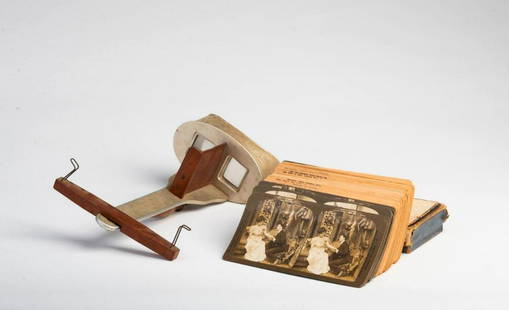 "Perescope" Stereograph Viewer and a Collection of: The stereoscope patented October 1895. With approximately 60 landscapes and domestic scenes dating from the early 20th century.