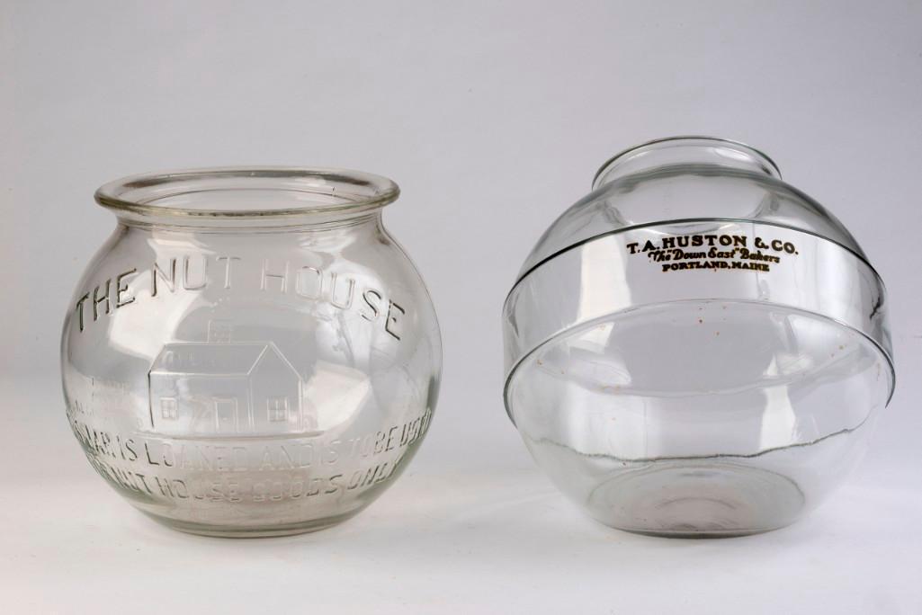 Two Glass Shopkeeper's Jars.: One "The Nut House," height 9 1/2 inches. The other "T.A. Huston & Co, Portland, Maine," height 10 inches.