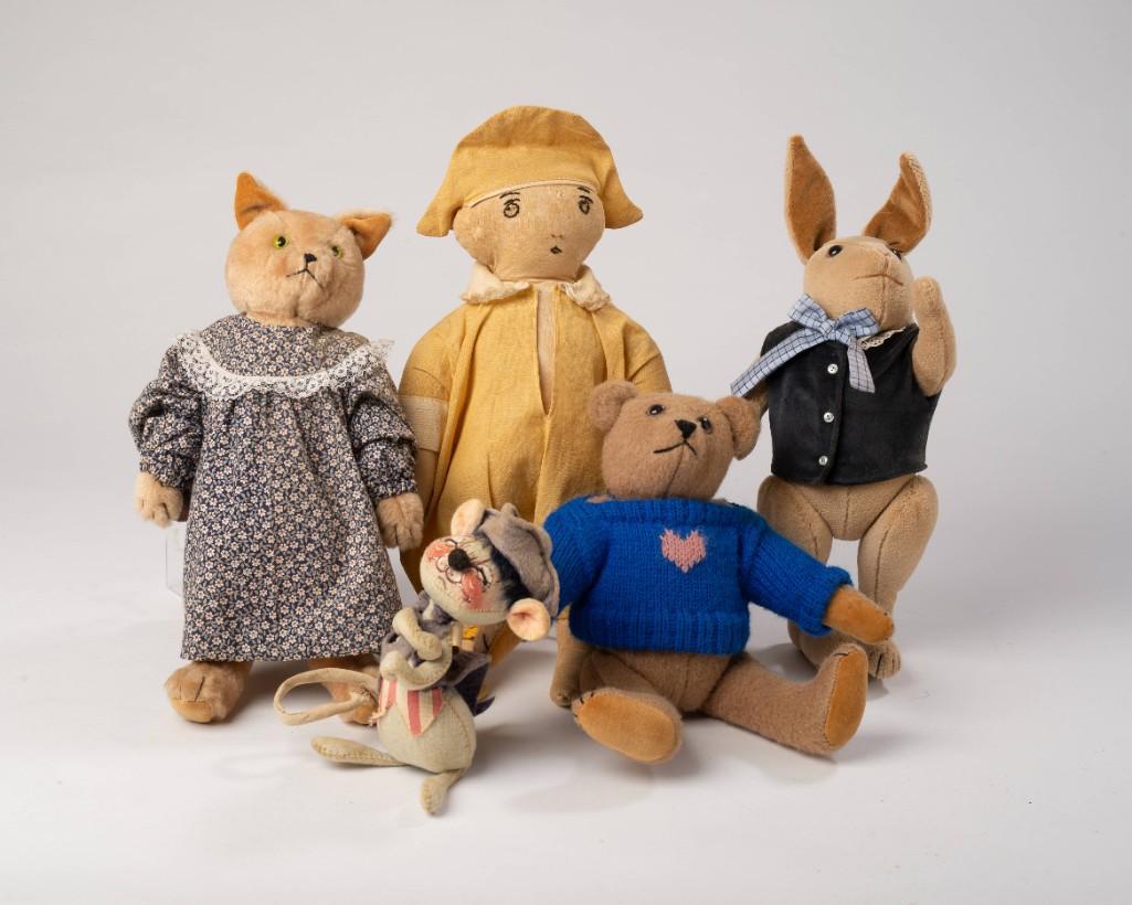 Group of Stuffed Figures.: Including a boy in yellow, height 14 inches, a cat in a floral dress, bear with a heart sweater, bunny in a vest, and a very cheerful mouse.
