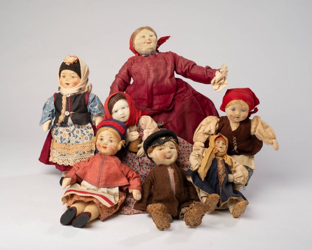 Seven Russian Dolls.: The largest, labeled "Made in Soviet Union / Attendant," height 14 inches. The others all labeled Made in Soviet Union.