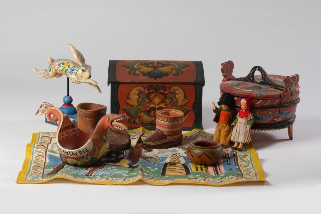 Group of Scandinavian Painted Items.: Including a dome top box, height 5 inches, length 7 1/2 inches, depth 4 3/4 inches, modern painted bunny, round footed box, cup in the form of a dragon, two wooden shoes, small bowl, two figures, and 