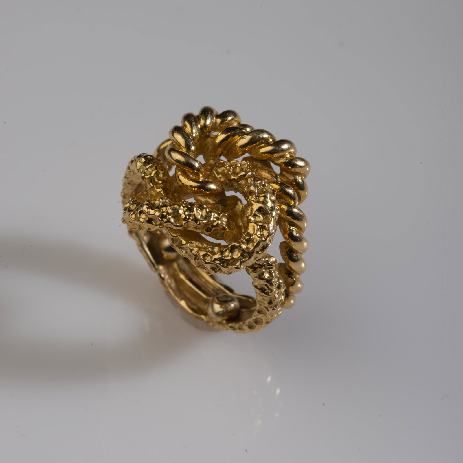 Tiffany & Co. 18K Gold Rope Ring.: Marked Tiffany & Co. 18K. SIze 8. 8 grams. Items may be previewed at our Freeport, Maine gallery prior to the close of the auction. Call 207-370-4746 or e-mail andrew@cascobayauctions.com to schedule 
