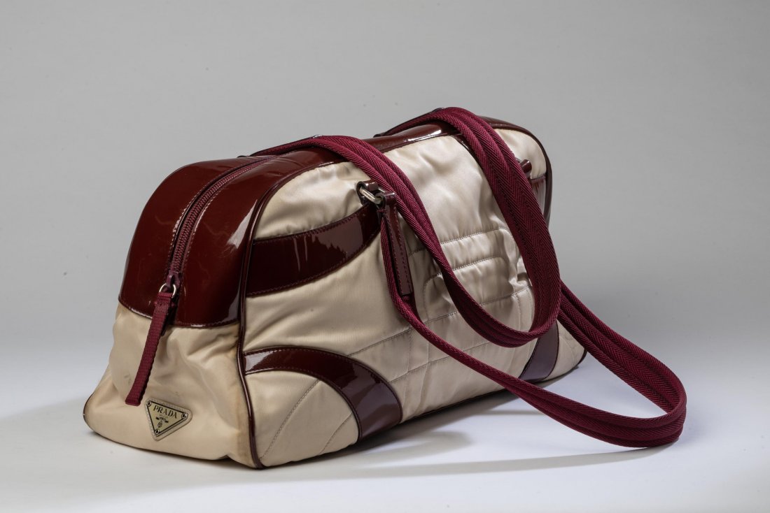 Prada Handbag.: Length 16 inches. Items may be previewed at our Freeport, Maine gallery prior to the close of the auction. Call 207-370-4746 or e-mail andrew@cascobayauctions.com to schedule an appointment Flat rate