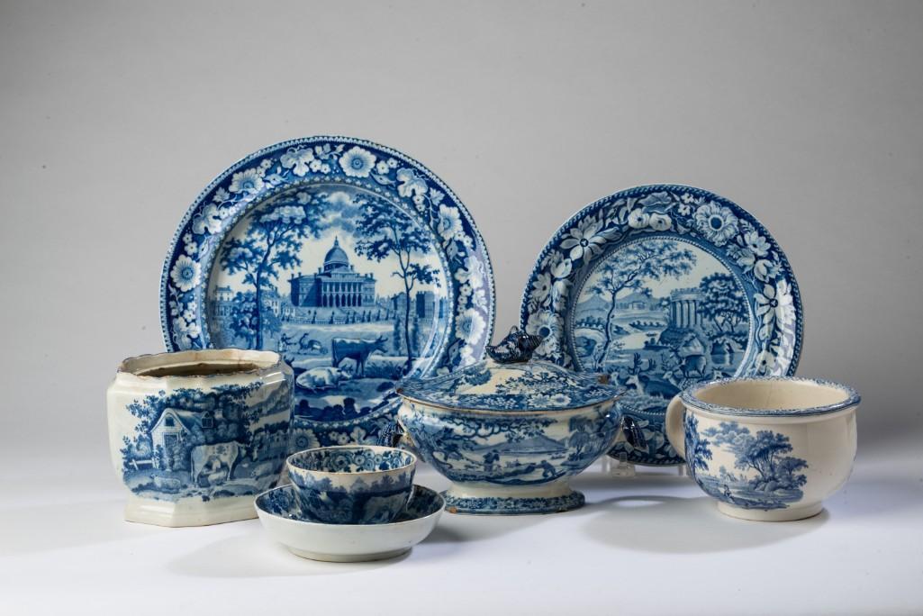 Group of Blue and White Staffordshire Pottery.: A historical blue Staffordshire Boston State House plate by Rogers, circa 1825, diameter 10 inches. Blue Staffordshire "Deer and Folly" plate, diameter 8 1/2 inches. Tea caddy, missing cover, teacup a