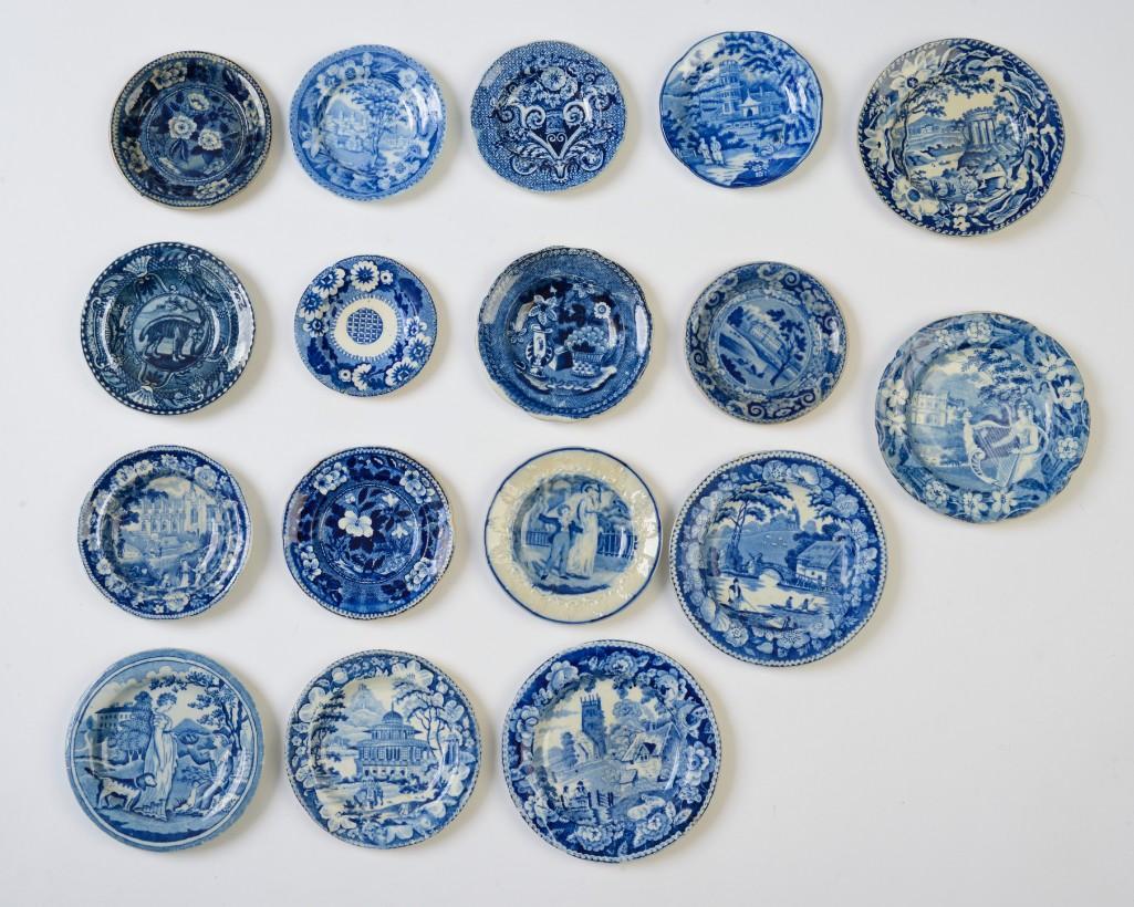 Group of Transfer Printed Ceramic Cup Plates.: Topographic and romantic views, 17 total. Diameter of largest 5 inches.