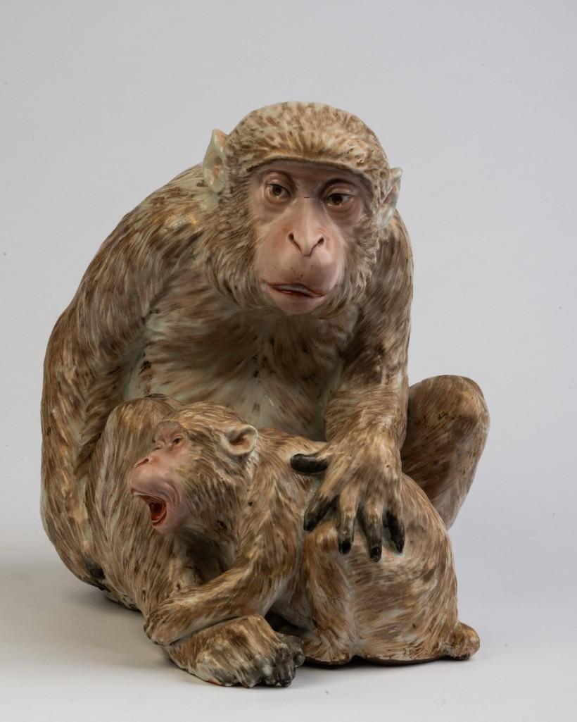 Ceramic Sculpture of a Mother Monkey and Child.: Height 12 inches, width 10 inches, depth 10 inches.