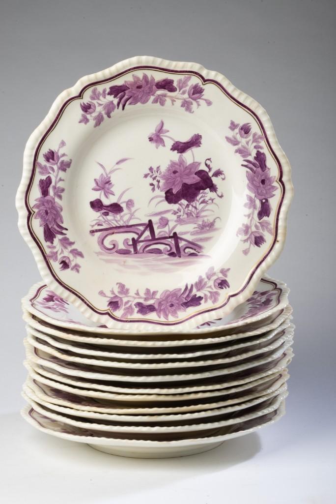 Set of Twelve Ironstone Plates.: Light purple transfer print with hand painted light and dark purple design. Diameter 10 inches.