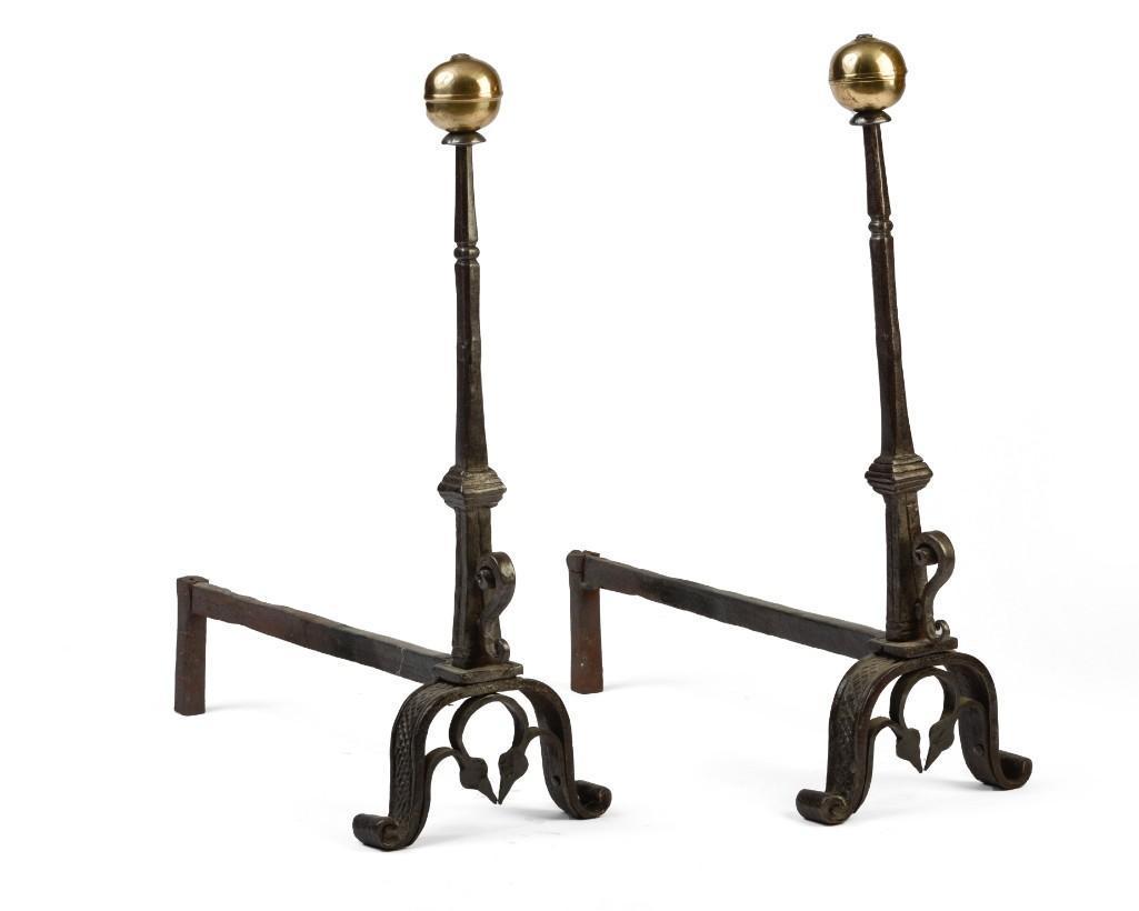 Pair of Iron and Brass Andirons.: Brass ball top above an octagonal standard, with engraved legs. Height 25 inches.