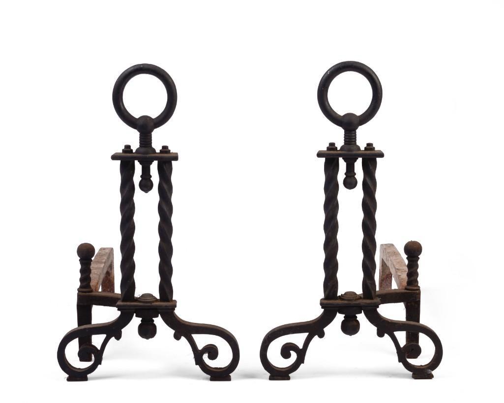 Pair of Bradley & Hubbard Cast Iron Andirons.: Height 19 inches.
