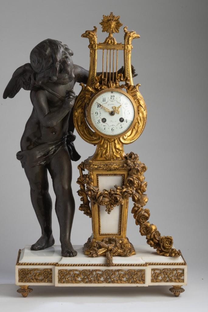 Large Louis XVI Style Ormolu and Bronze Mantel Clock.: On a marble base, height 24 1/2 inches. Maker's name obscured, operation untested.