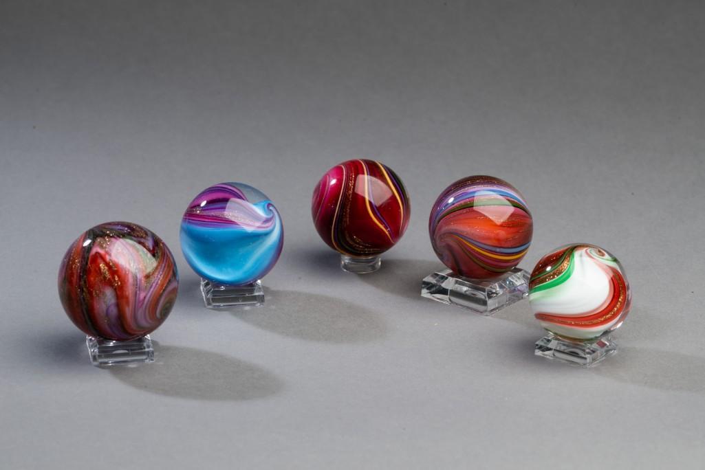 Five Hamon Marbles.: Contemporary marbles by Robert Hamon, circa 19995-99. With lutz, diameters 1 5/8 to 1 9/16 inches.