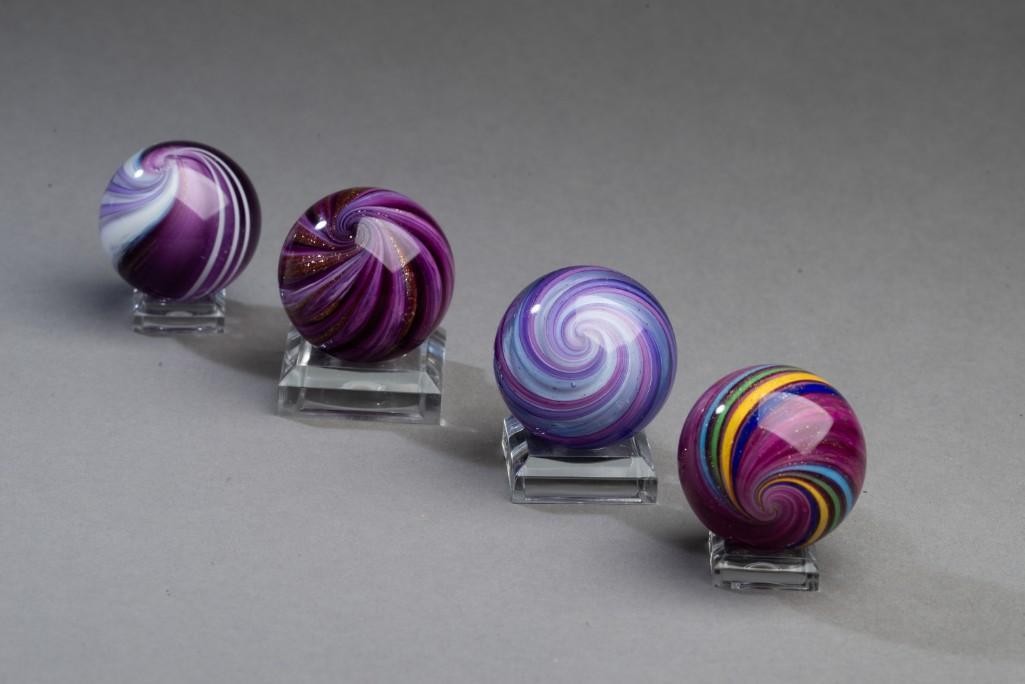 Four Hamon Marbles.: Contemporary marbles by Robert Hamon, circa 1996-97. Diameters 1 1/2 to 1 9/16 inches.