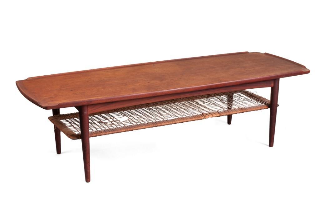 Mid Century Modern Coffee Table by Selig.: Length 59 inches, height 16 1/2 inches, depth 22 inches. Shelf needs re-caning. Detailed condition reports are available upon request. Due to the current stay at home order, in-person preview will not