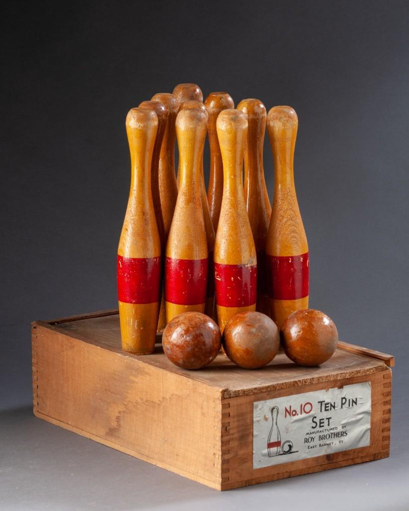 Roy Brothers Ten Pin Set.: Bowling set manufactured by Roy Brothers, East Barnet, Vt. Includes ten pins and three balls. In original box, 13 1/2 x 9 x 4 inches. Detailed condition reports are available upon request. Due to the 