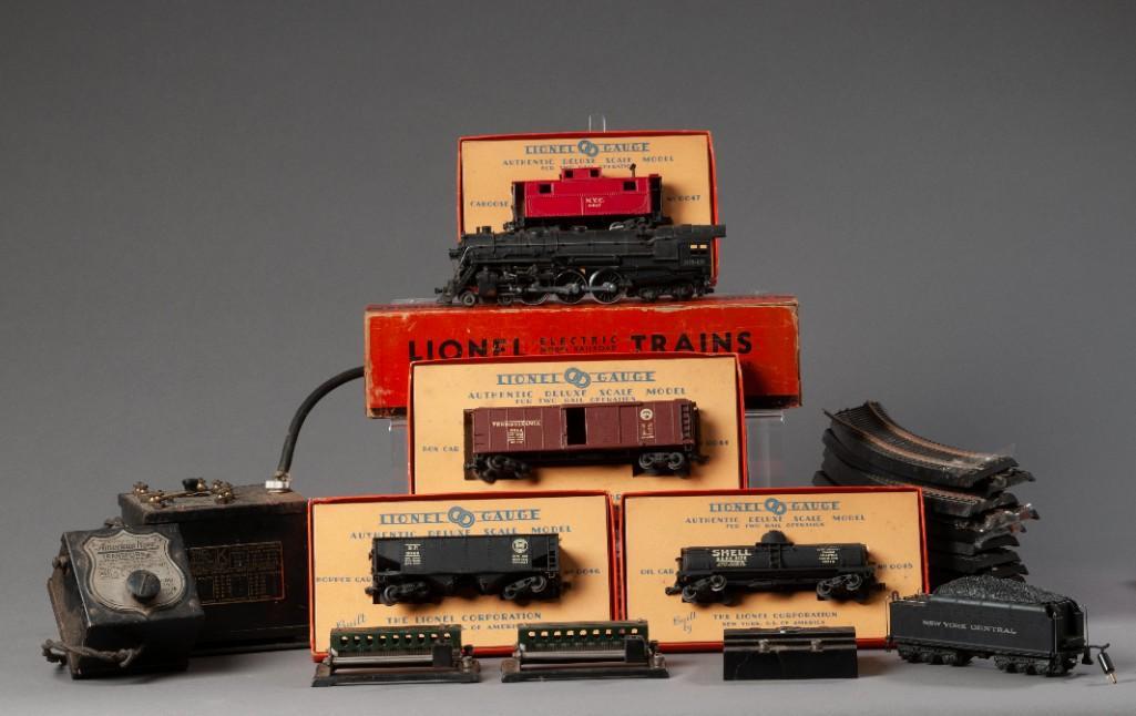 Lionel Train Set.: Including 5342 Hudson Locomotive, 044 box car in original box, 046 hopper car in original box, 0045 oil car in original box, coal car, 12 sections of track, a Lionel K multivolt transformer, and an Am
