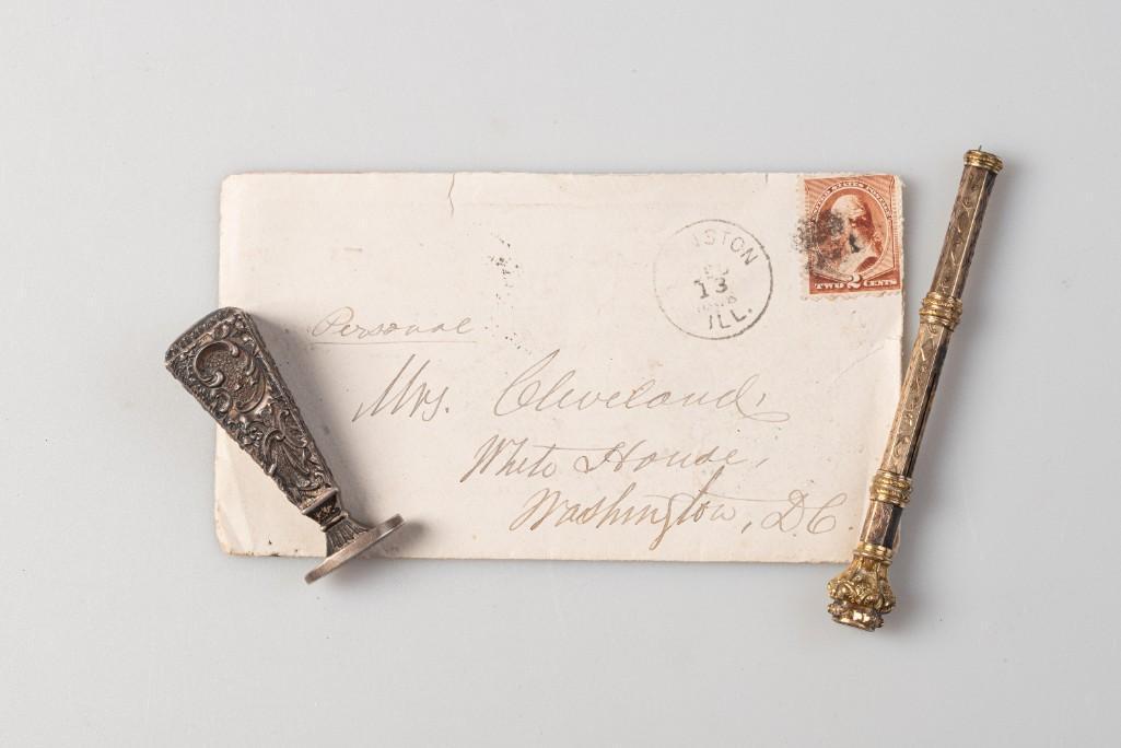 Group of Frances Cleveland Ephemera.: Including a letter from her mother, addressed to Mrs. Cleveland, White House, Washington DC, a wax seal, and a pen.
