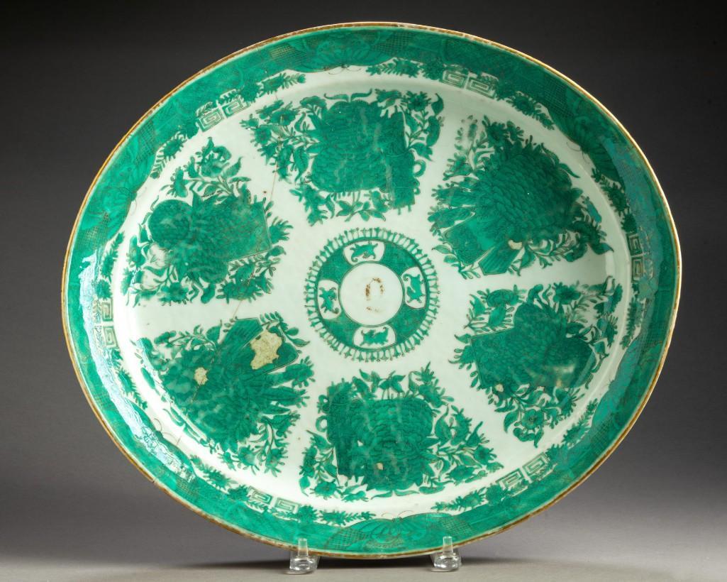 Chinese Export Porcelain Green "Fitzhugh" Oval Platter.: Nineteenth century, 18 x 16 inches, old staple repair. Painted in black enamel in the center medallion with the initial â€œQ” in foliate script, encircled by four qilin alternating with trelli