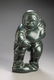 Signed Inuit Carving of a Seal Hunter.