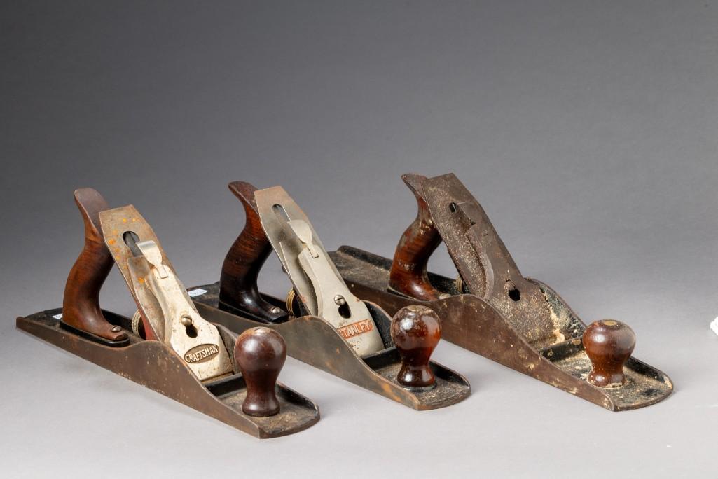 Three Metal Planes.: Stanley Bailey #5, length 14 inches, Craftsman, length 14 inches, Stanley Bailey #6, length 18 inches.