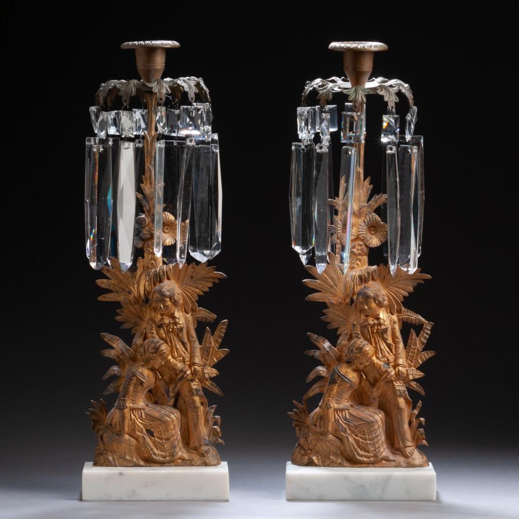 Pair of American Gilt Metal Candlesticks.: Pair of American rococo revival gilt-brass, glass and marble â€˜Paul and Virginiaâ€™ candlesticks, probably Philadelphia, 1840-61. Each cast with a couple, overall height 15 1/2 inches.