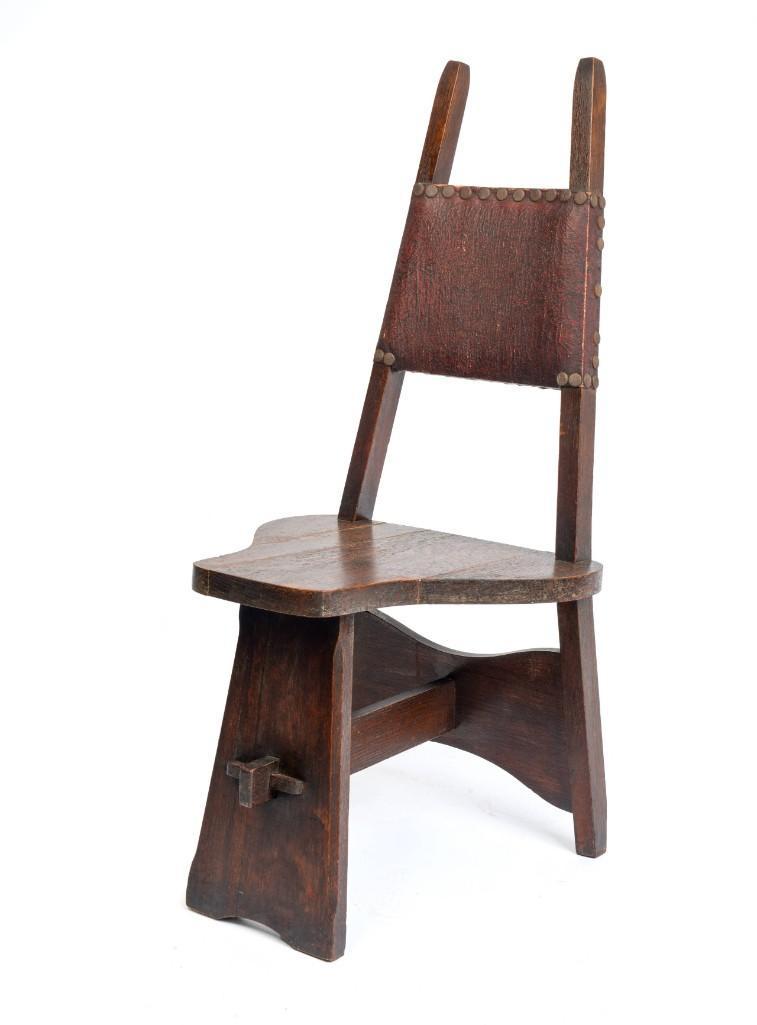 Limbert Oak "Bicycle" Chair # 79.: Unsigned, seat height 17 1/2 inches, overall height 42 inches. Some varnish loss and wear to leather back, small loss to one foot, seat appears to be re-glued.