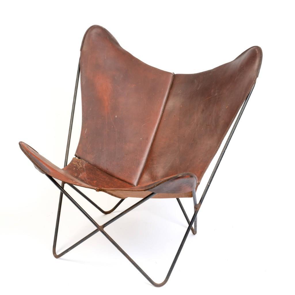 Early Knoll Butterfly Chair With Leather Sling Seat.: Hardoy, Bonet and Kurchan Design, signed with Knoll label. Height 34.5 inches, width 32.5 inches, depth 28 inches.