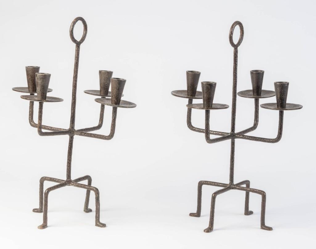 Pair of Iron Candelabra.: Attributed to Tommi Parzinger, height 17 inches.