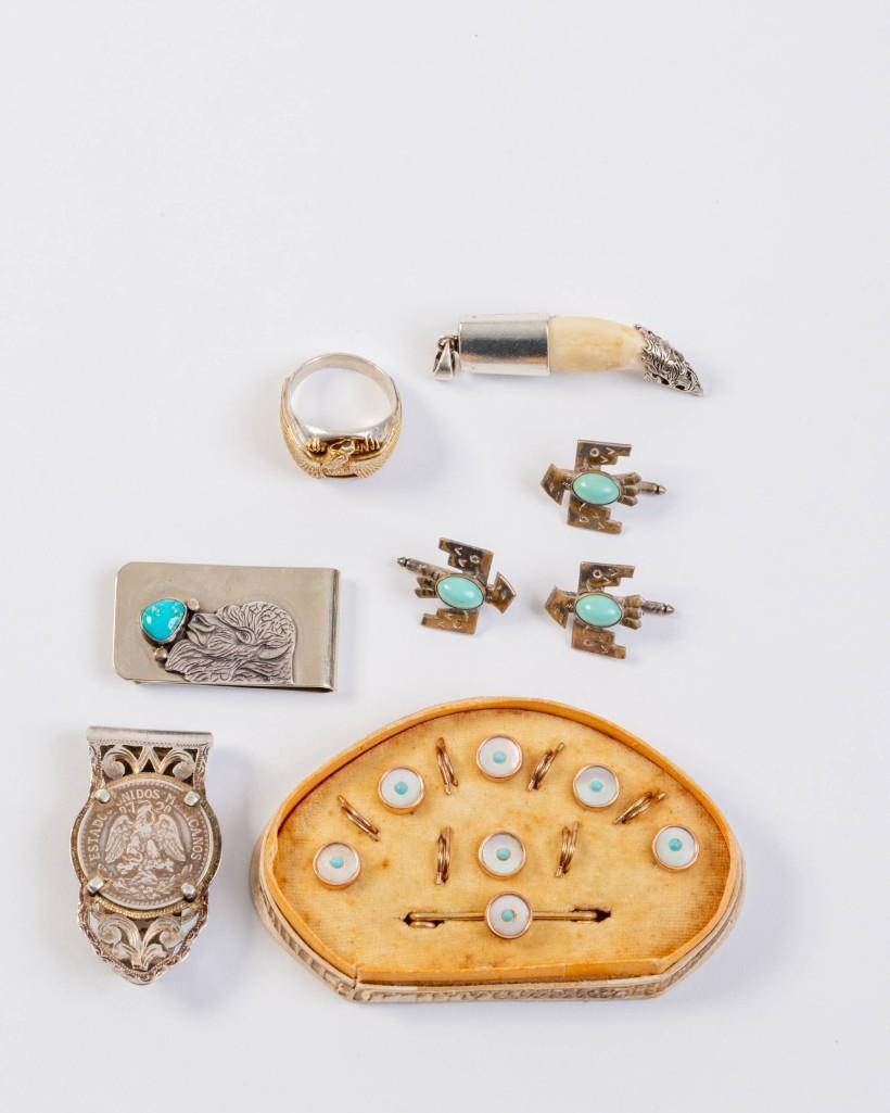 Group of Southwestern Men's Jewelry.: Including a turquoise and mother of pearl tie clip and cufflink set, Mexican silver money clip, money clip with bull design, sterling ring, bone and silver pendant, and three Native American design cu