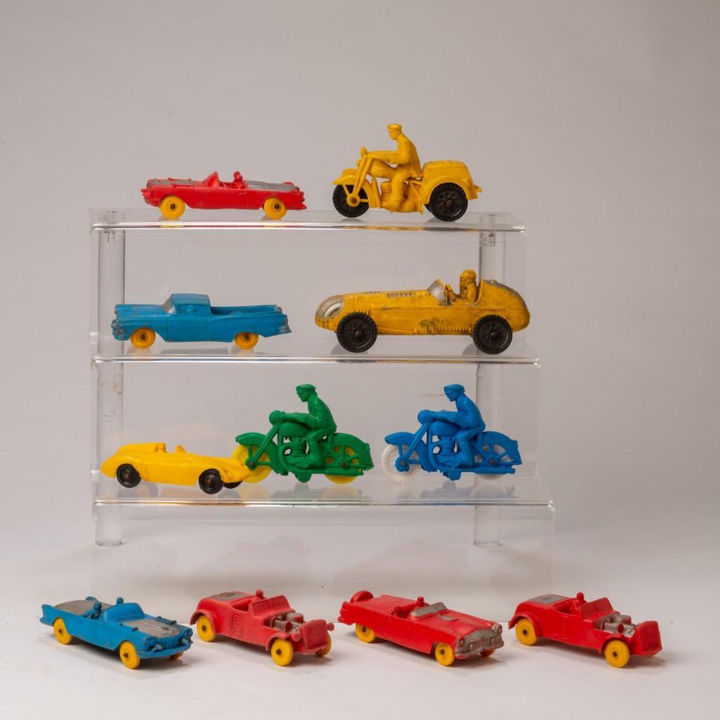11 Auburn Rubber Cars and Motorcycles.: Longest vehicle 6 inches. Tallest vehicle 2.5 inches.